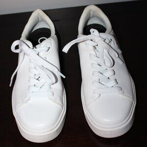 Calvin Klein sneakers, white with black heel.